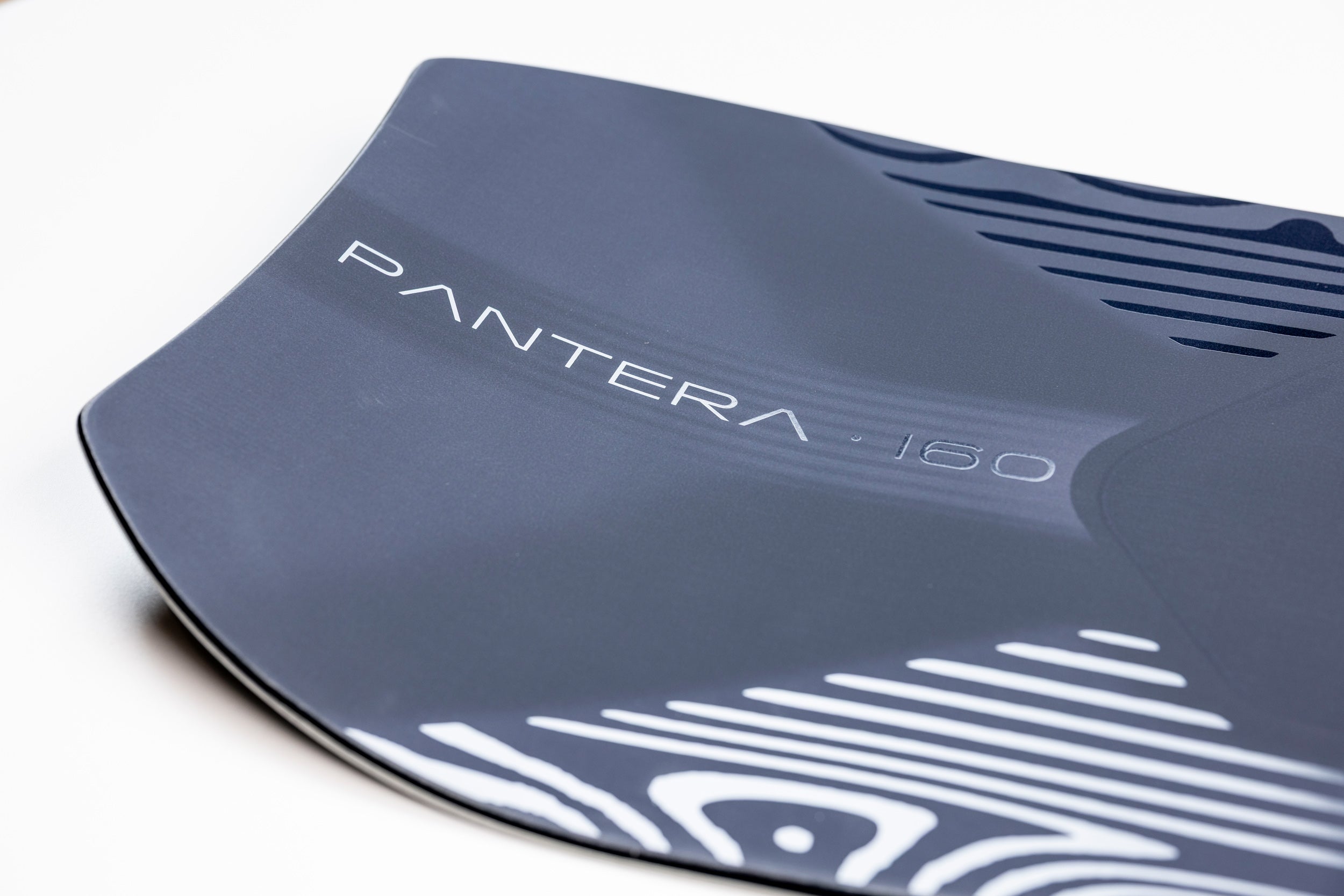 Nitro Pantera Snowboard 2027 with Nitro branding, showcasing the tail detail and sleek snowboarding design.