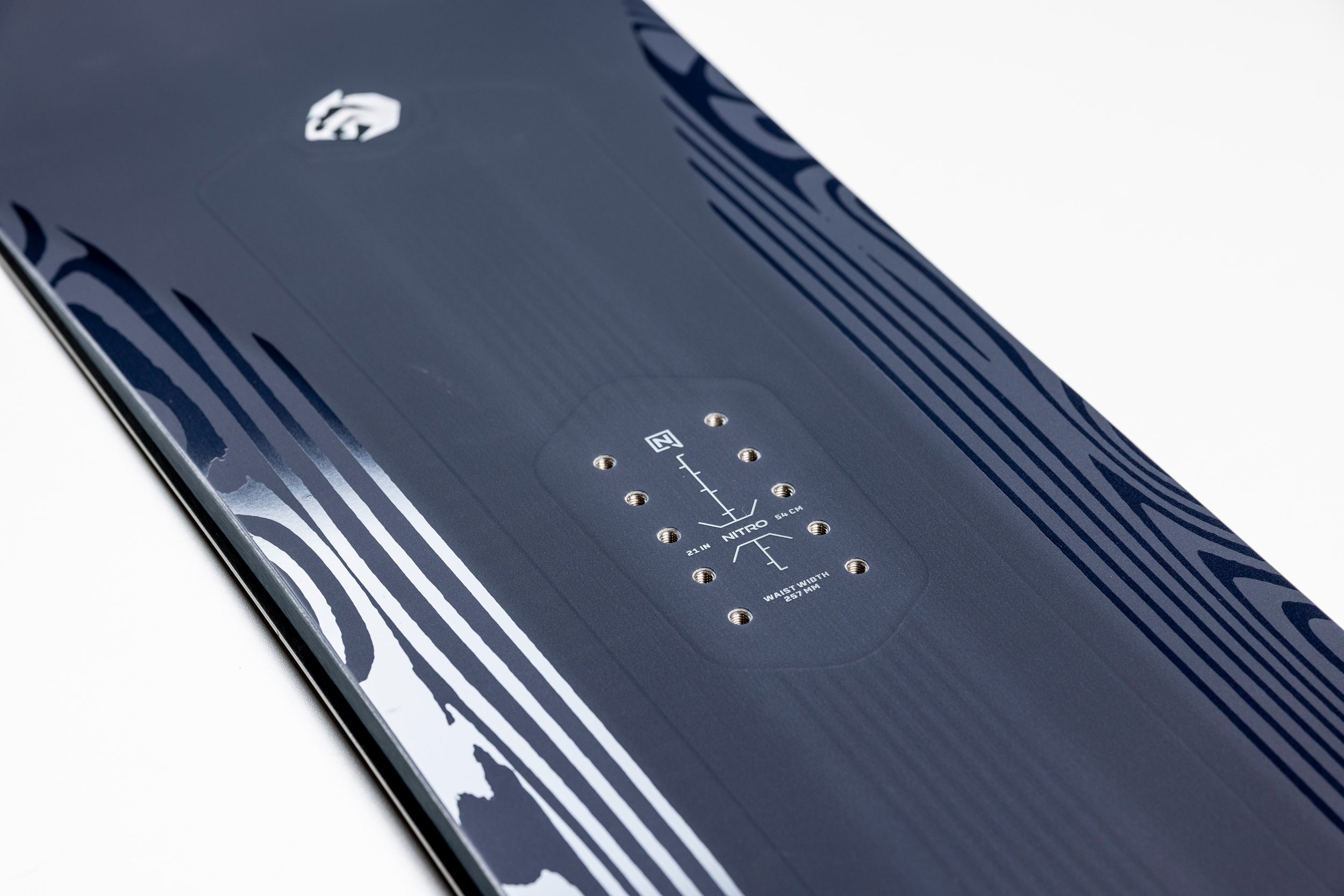 Close-up of the Nitro Pantera Snowboard 2027 showing front binding inserts and detailed top surface design.