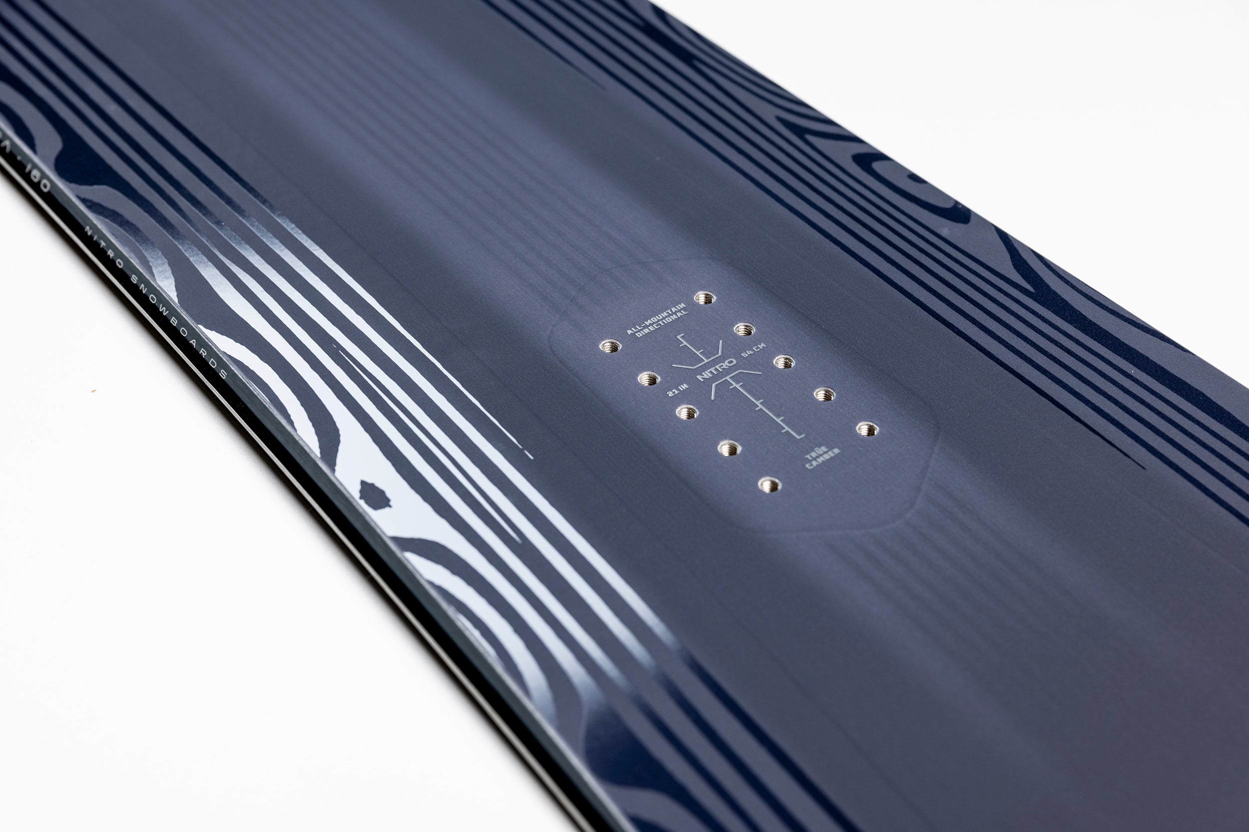 Nitro Pantera Snowboard 2027 with rear binding inserts and camber detail, designed for snowboarding performance and style.
