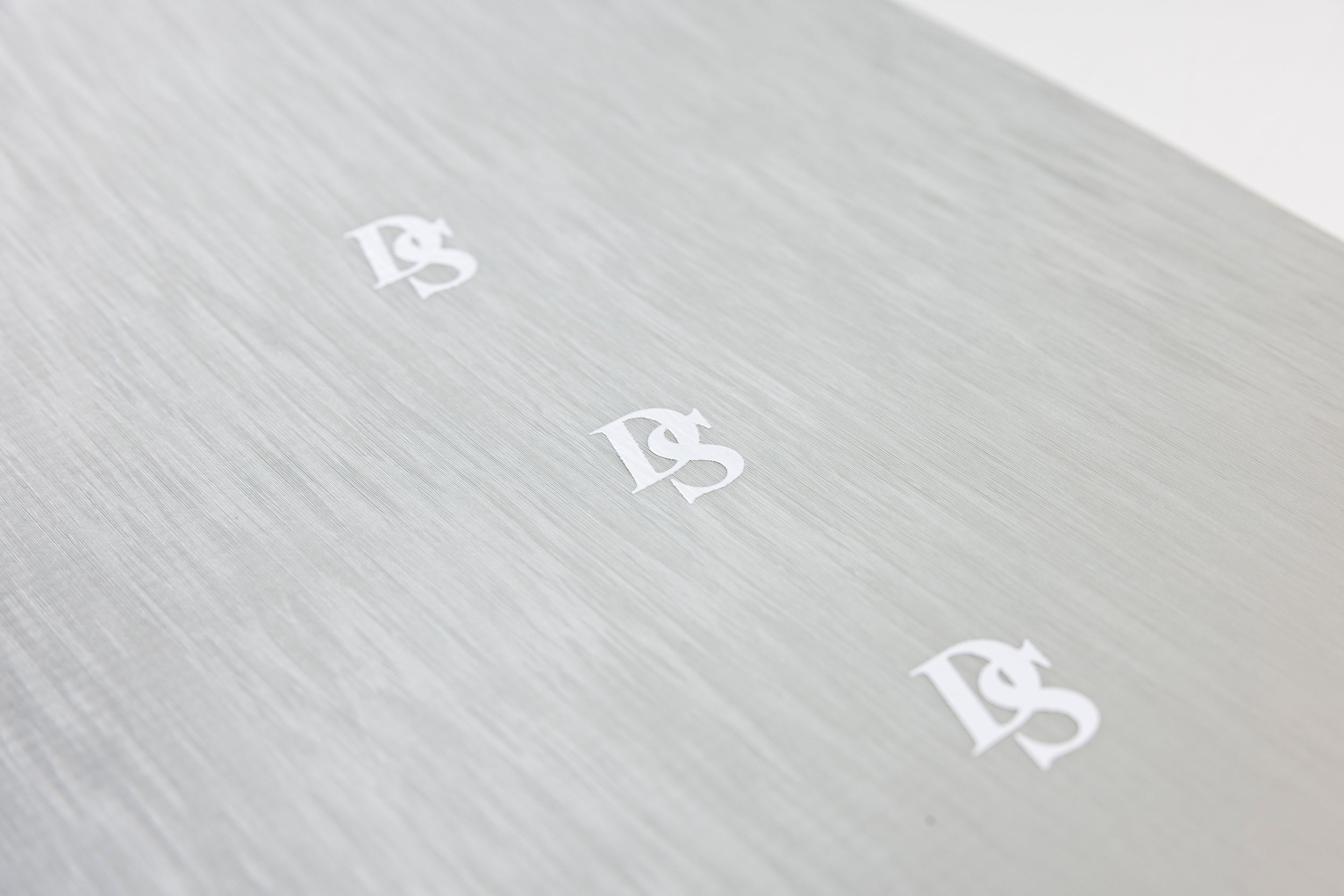 Nitro Santoku Snowboard 2027 with Nitro logo detail, showcasing the sleek design and branding on this snowboard for winter snowboarding.