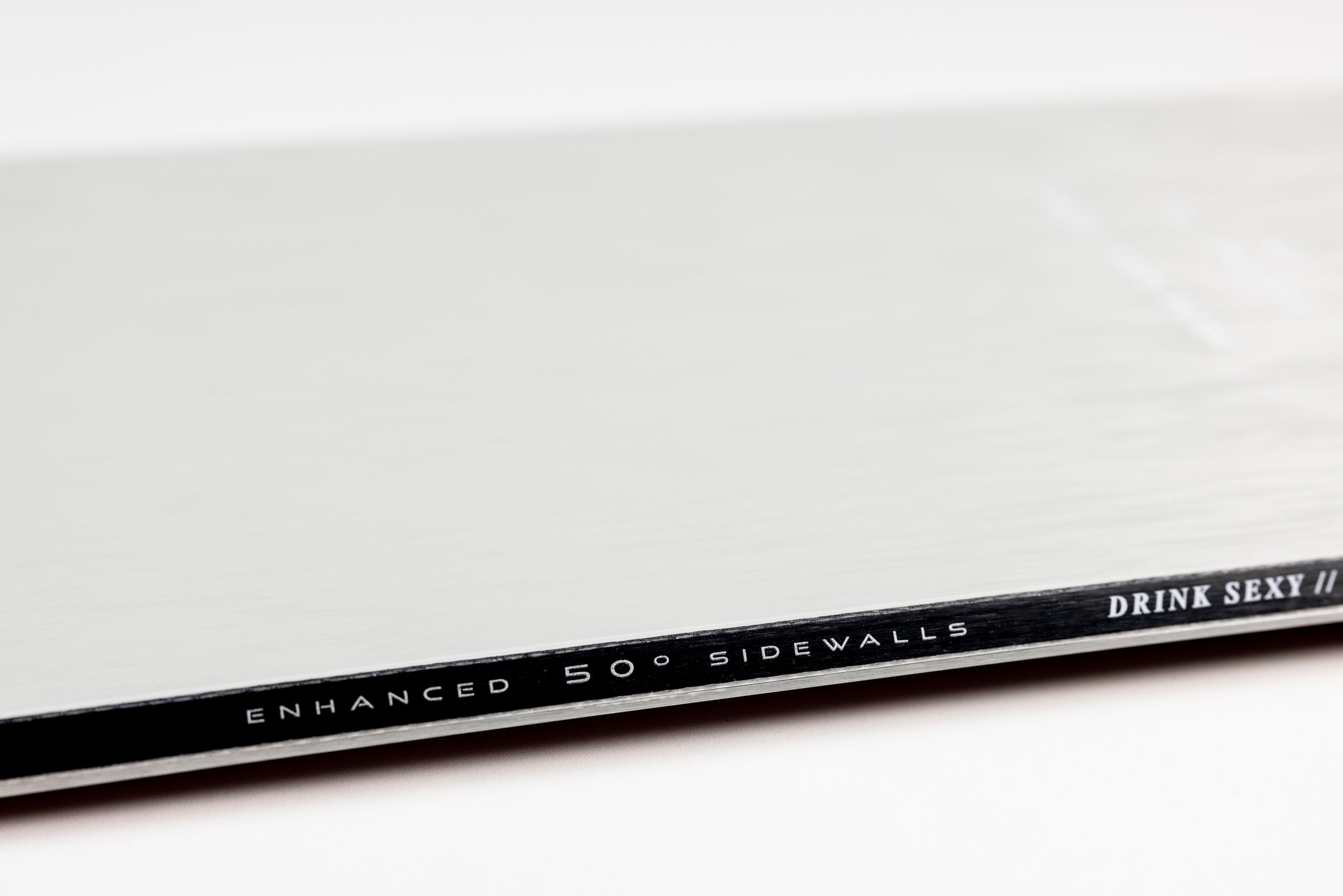 Close-up of Nitro Santoku Snowboard 2027 showing sidewall construction with detailed edge and core features.