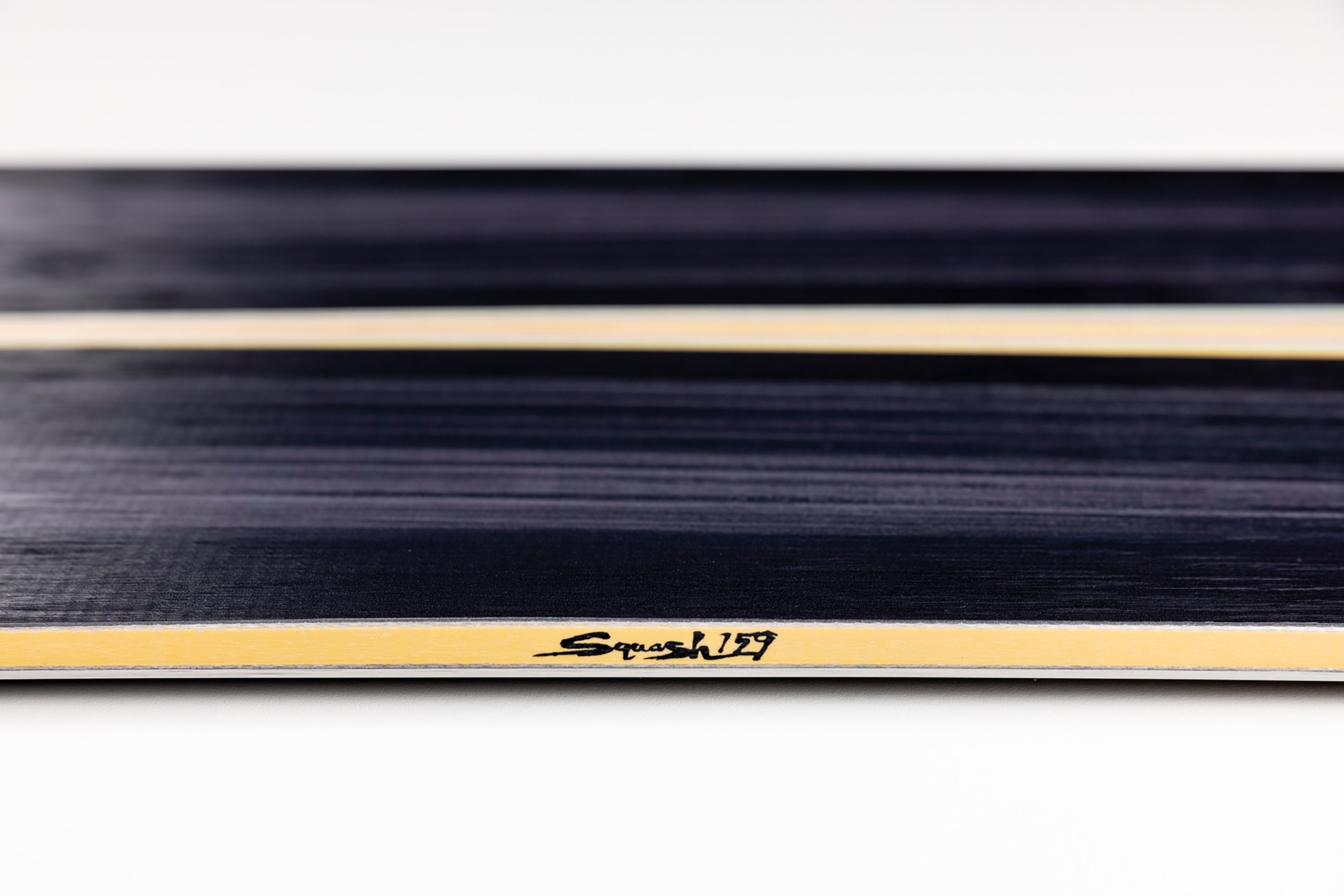 Nitro Squash Snowboard 2027 sidewall detail showing the snowboard's design and size for snowboarding in winter conditions.