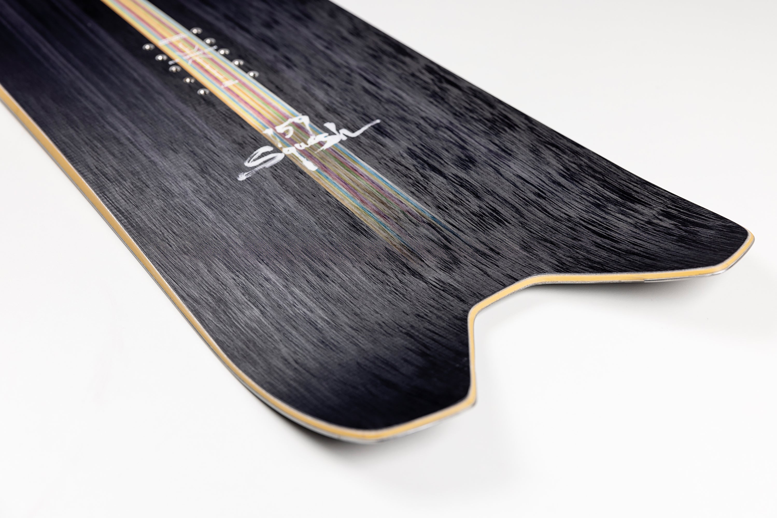 Nitro Squash Snowboard 2027 with swallowtail design, showcasing its sleek shape and detailed graphics on snow.