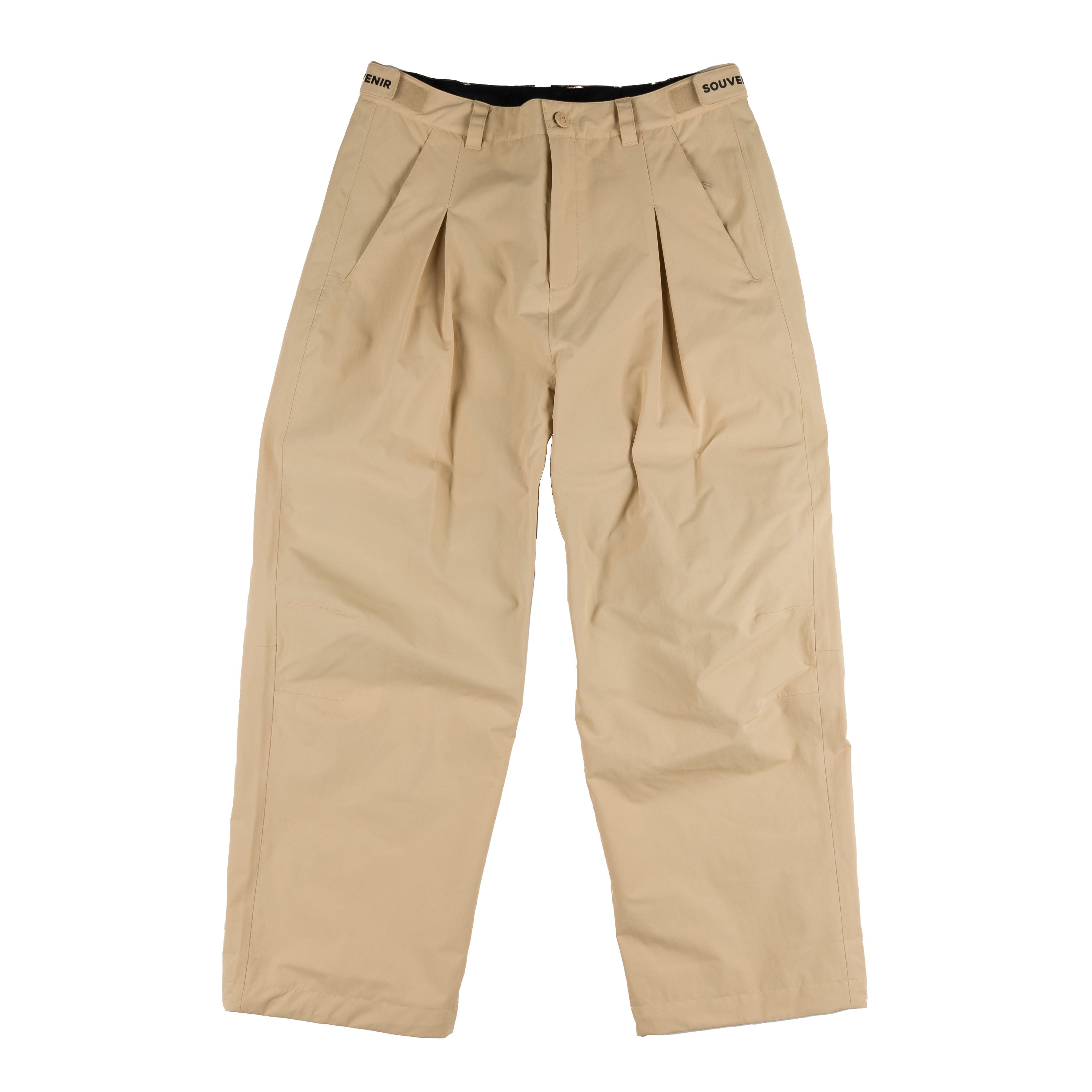 Souvenir Pleated Chino Pant 2027 in British Khaki shown from the front with oversized baggy fit, pleated construction, articulated knees and adjustable waistband.