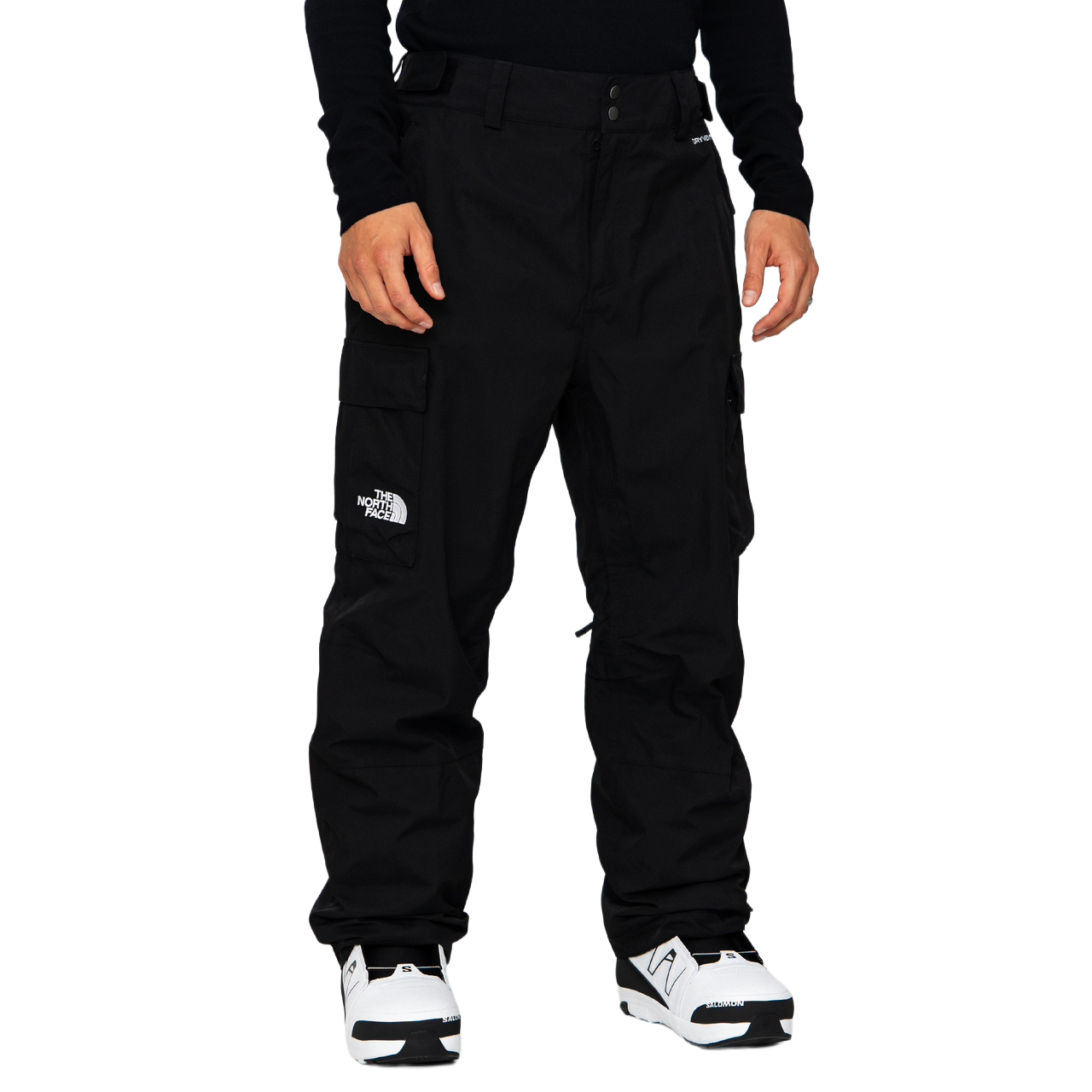 The North Face Men’s Blizzardery Cargo Pants in TNF Black shown from a front three-quarter angle with thigh cargo pockets, adjustable waist tabs and relaxed freeride fit.