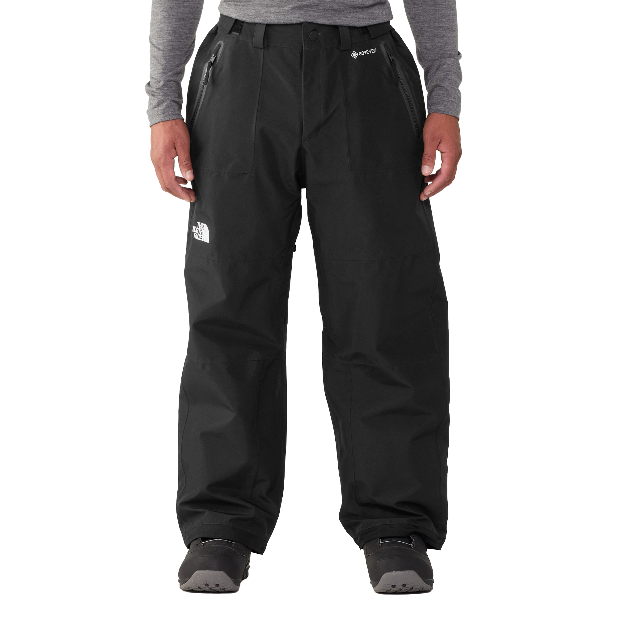 Front on-body view of The North Face Men’s GORE-TEX Hex Pants in TNF Black showing the relaxed fit, zippered pockets and full-length snow pant silhouette.