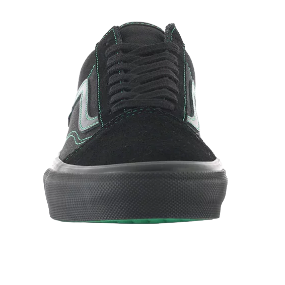 Front view of the Vans Skate Old Skool showing the black suede toe, black laces and green contrast stitching.