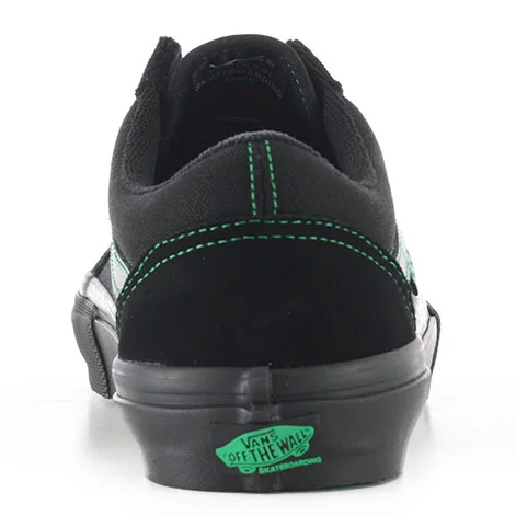 Rear view of the Vans Skate Old Skool showing green heel stitching and green Vans Off The Wall Skateboarding heel patch.