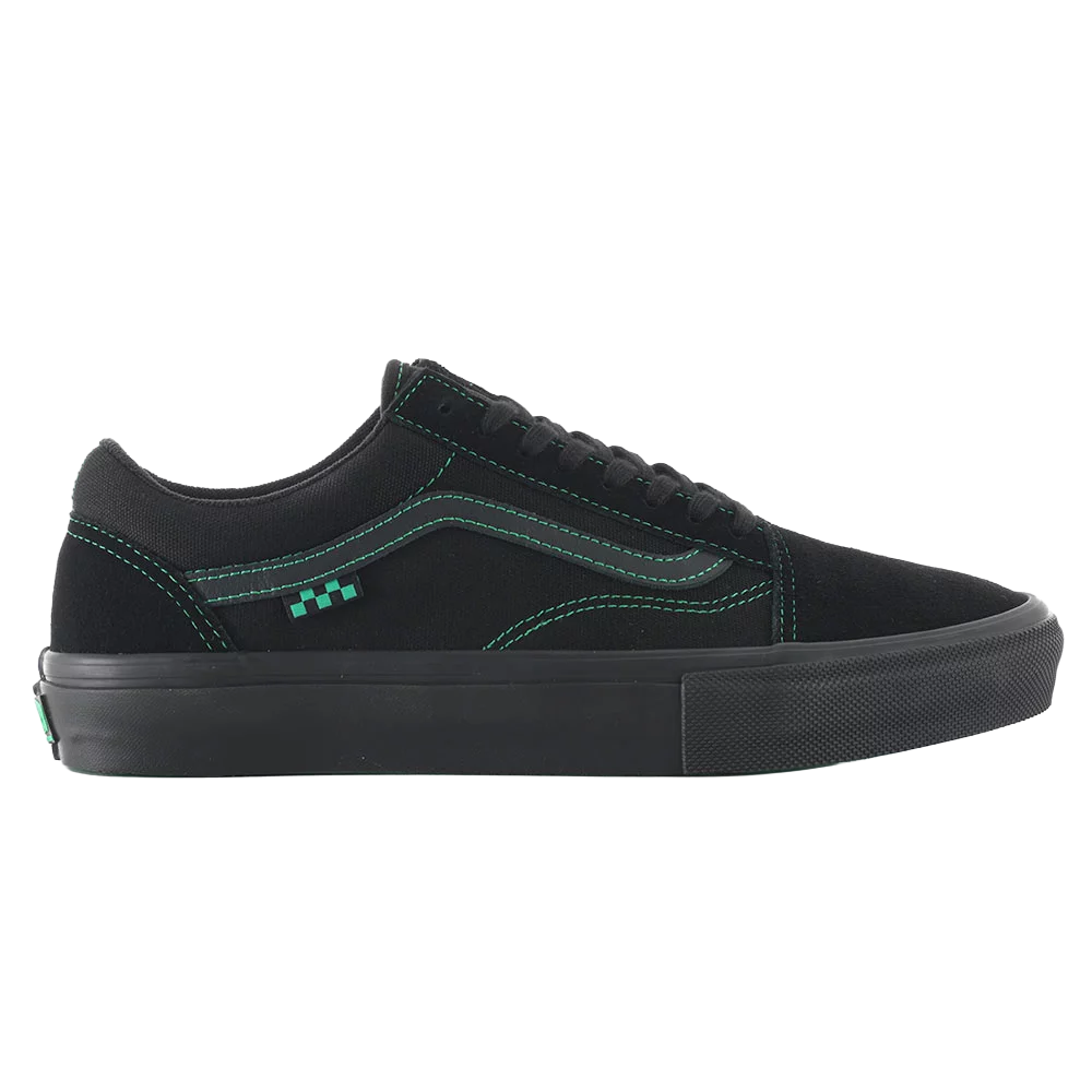 Vans Skate Old Skool skate shoe in black with green contrast stitching, outer side profile with suede upper and black vulcanized sole.