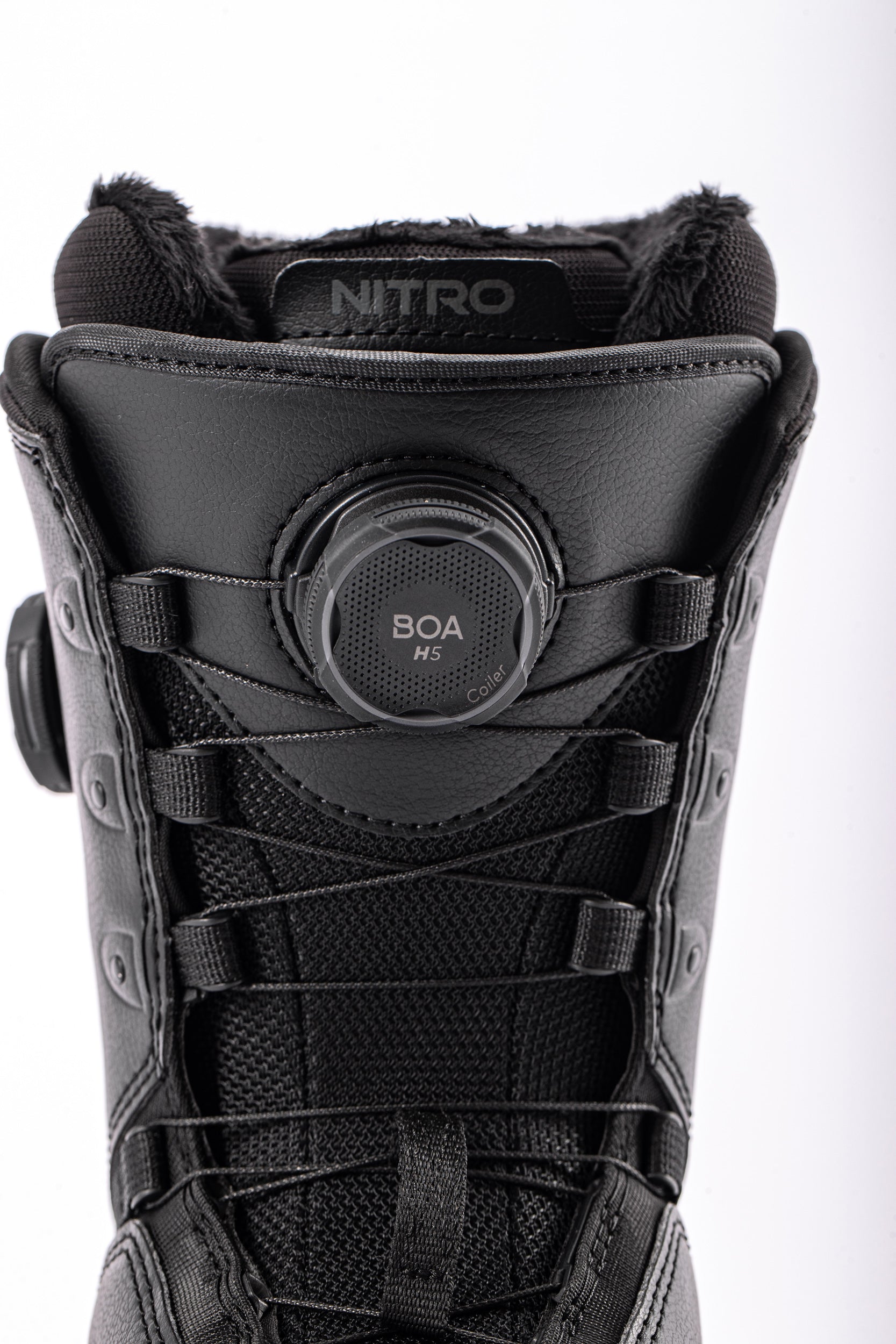 Front view of Nitro Crown Boa Women's Snowboard Boots 2027 with adjustable laces and padded ankle support, designed for snowboarding.