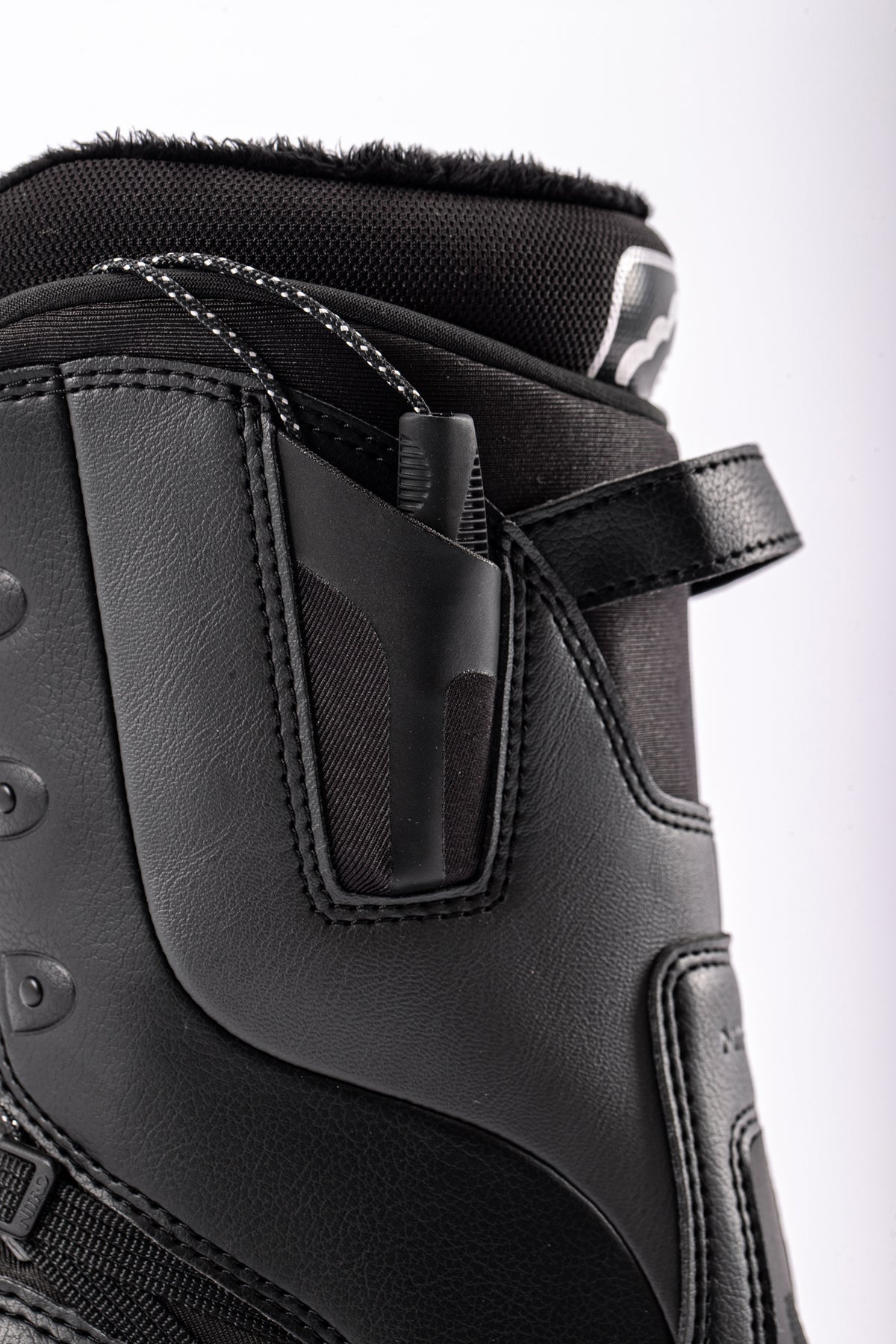 Nitro Crown TLS women's snowboard boots showcasing black and red design, heel loop, and sturdy snowboarding features.