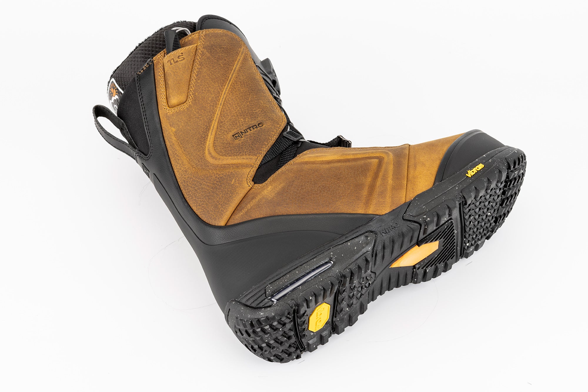 Nitro El Mejor TLS+ snowboard boots for 2027 laid flat, showing black and gray design with secure lacing system and branding details.