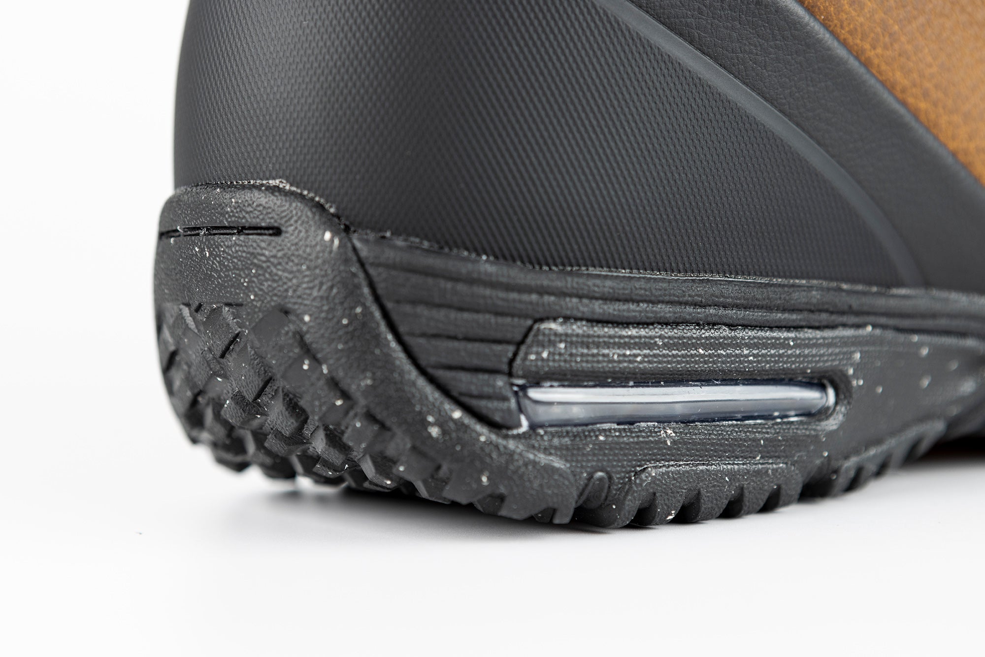 Nitro El Mejor TLS+ snowboard boots for 2027, showing the heel with branding and design details on a snowy background.