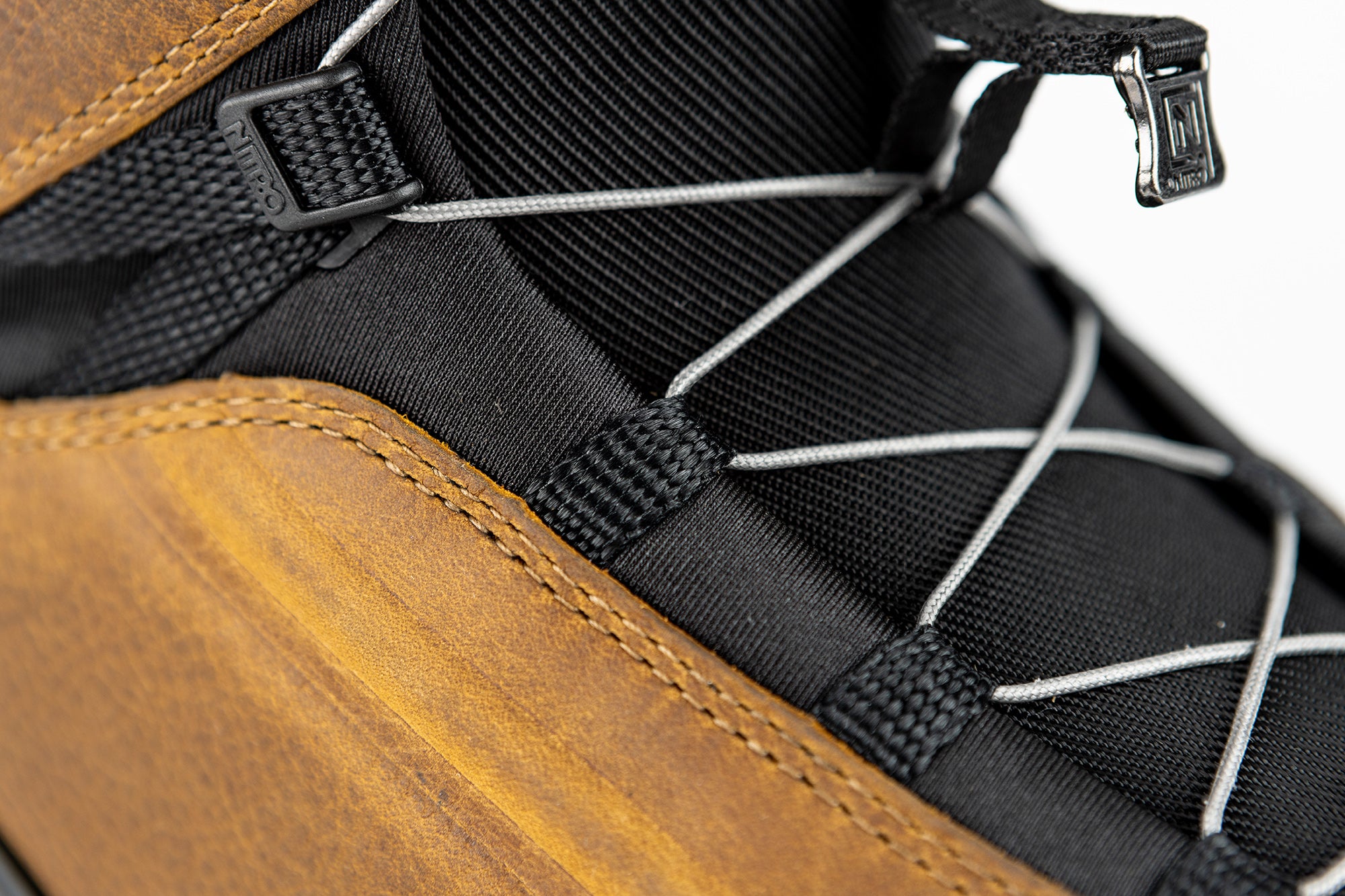 Nitro El Mejor TLS+ snowboard boots 2027 with laces, black and gray design, showcasing the upper and lacing system.