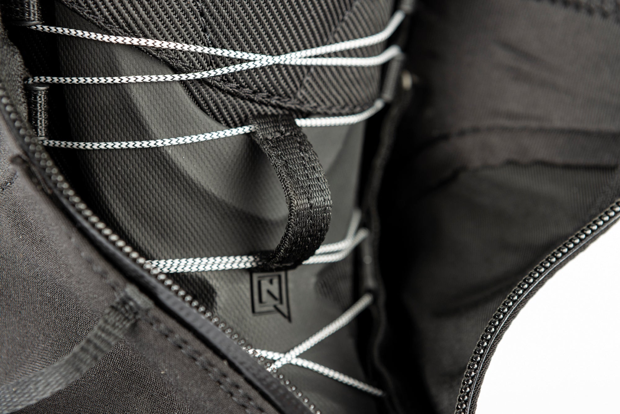 Nitro Select Boa snowboard boots for snowboarding, featuring laces and a sleek black design, suitable for winter snow sports.