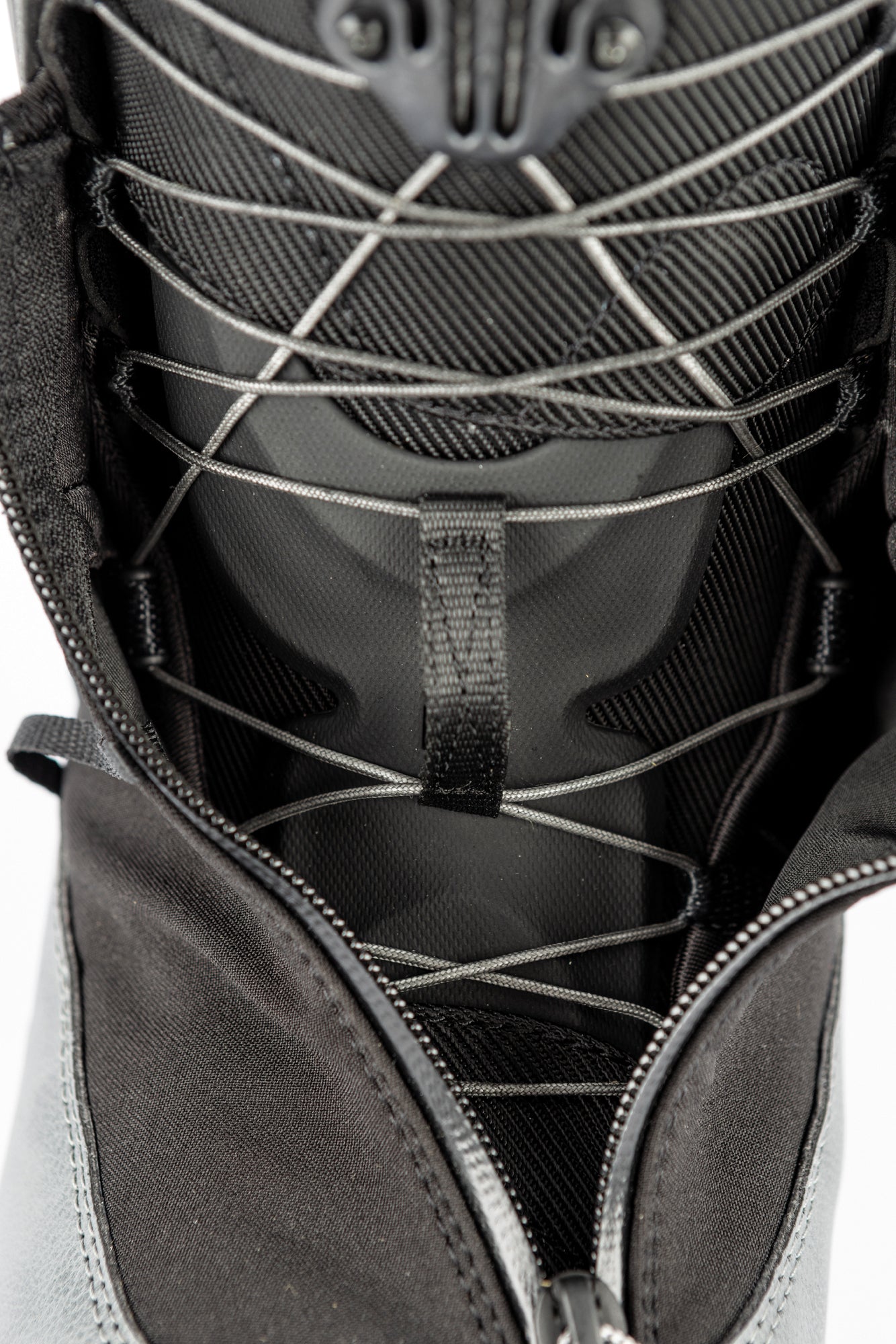 Nitro Select TLS+ snowboard boots for 2027 with laces, designed for snowboarding, featuring black and white color scheme and supportive fit.