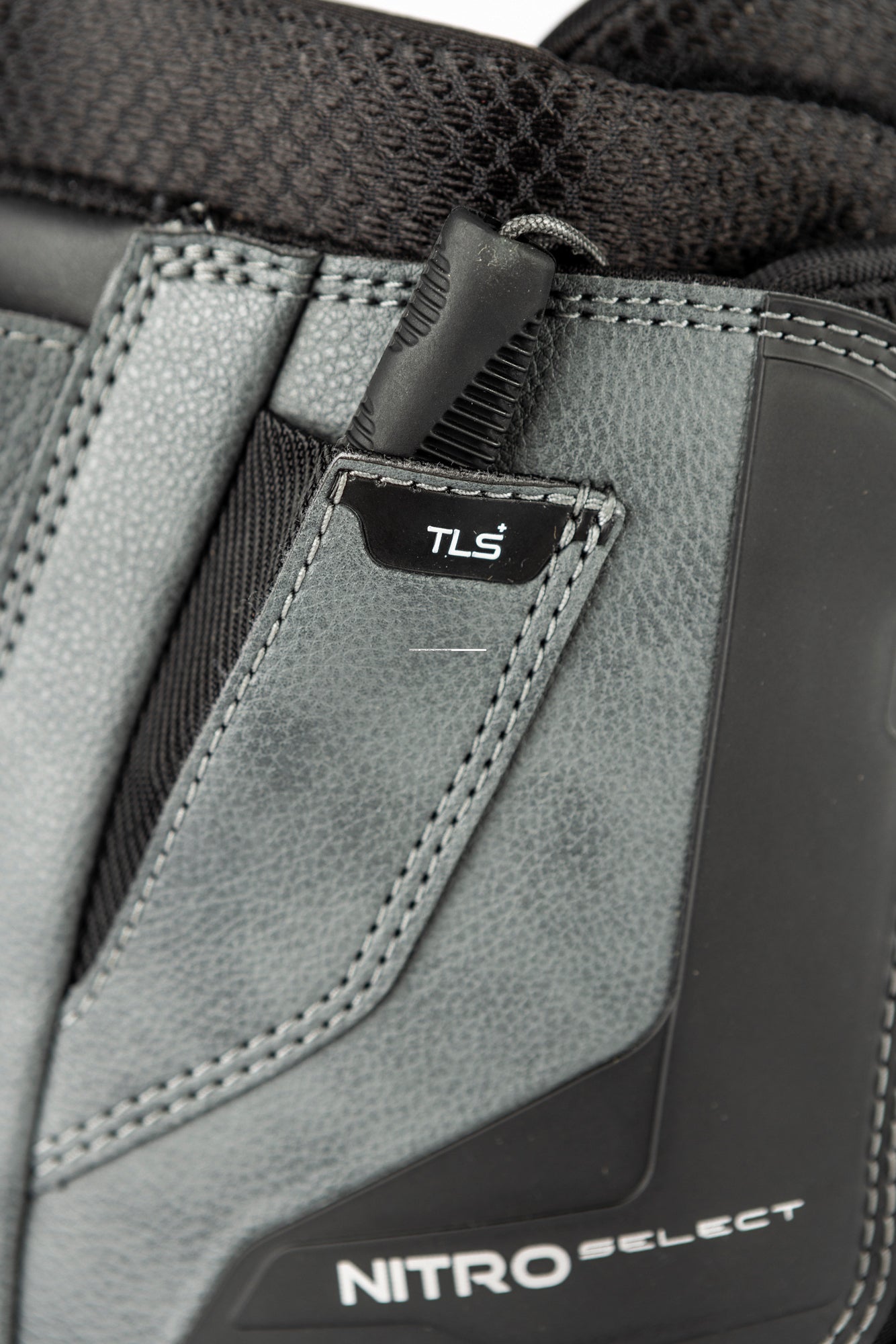 Black Nitro Select TLS+ snowboard boots for 2027 with secure lacing system, shown with a close-up of the boot's side and branding.