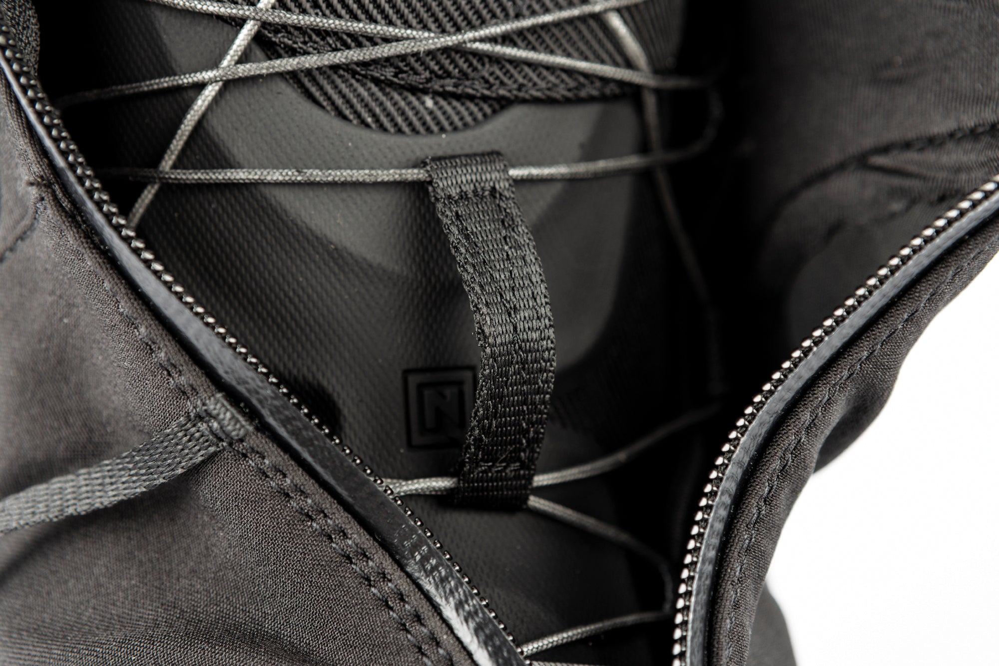 Nitro Select TLS+ snowboard boots 2027 with unzipped design and padded interior, designed for snowboarding comfort and performance.