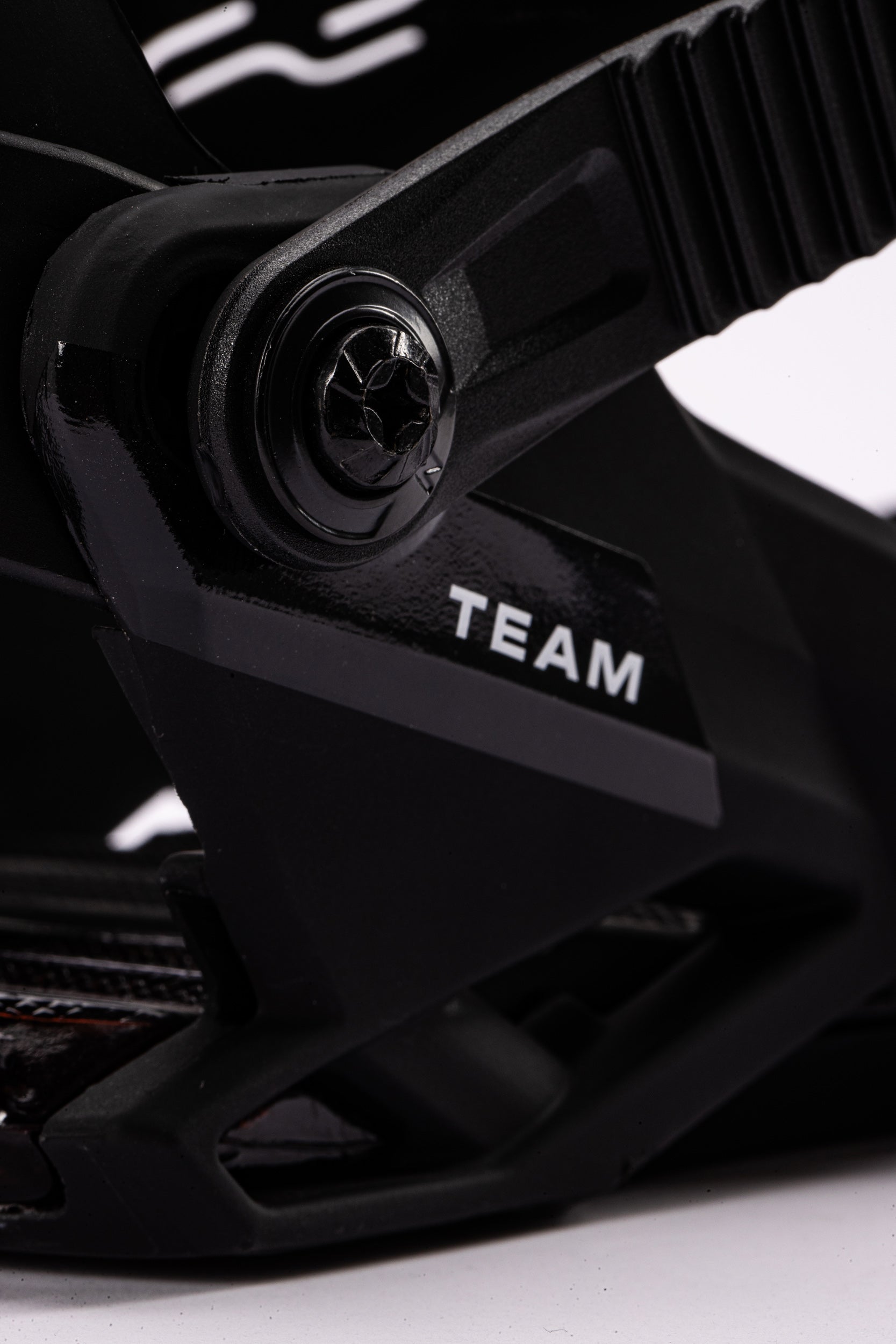 Black Nitro Team snowboard bindings with logo, designed for snowboarding in 2027, featuring durable construction and adjustable straps.