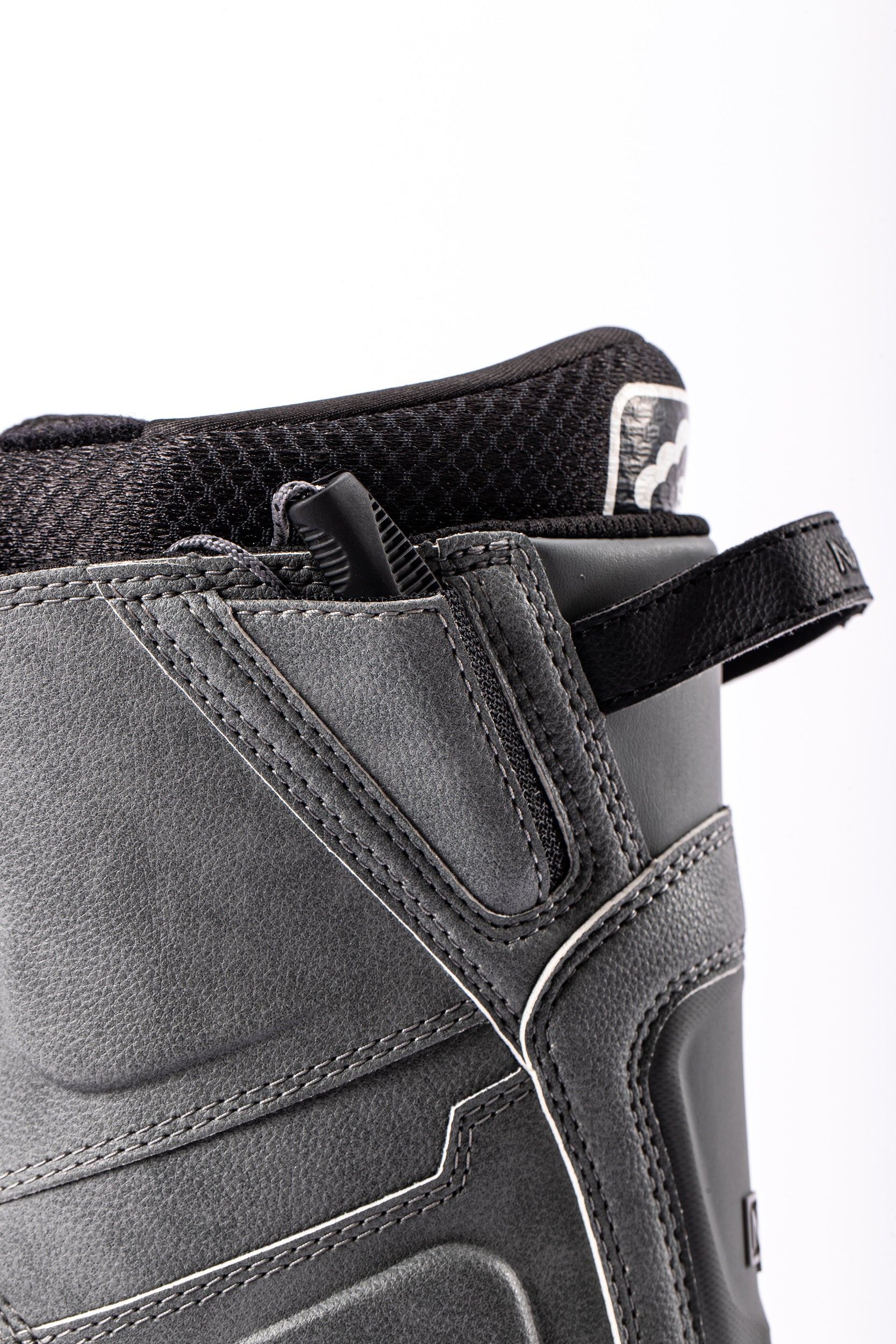 Grey Nitro Team TLS Snowboard Boots with heel loop and secure lacing system, designed for all-mountain snowboarding.