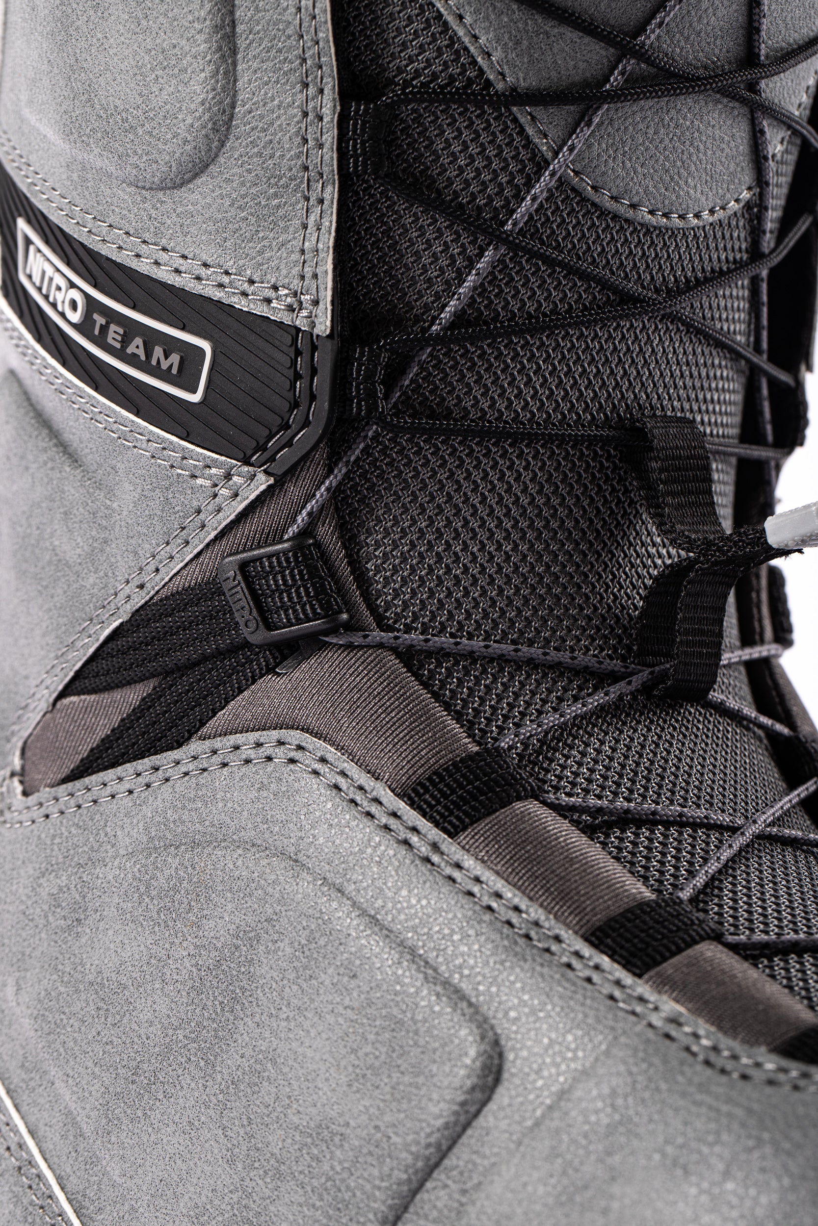Grey Nitro Team TLS Snowboard Boots with laces, designed for snowboarding performance and comfort.