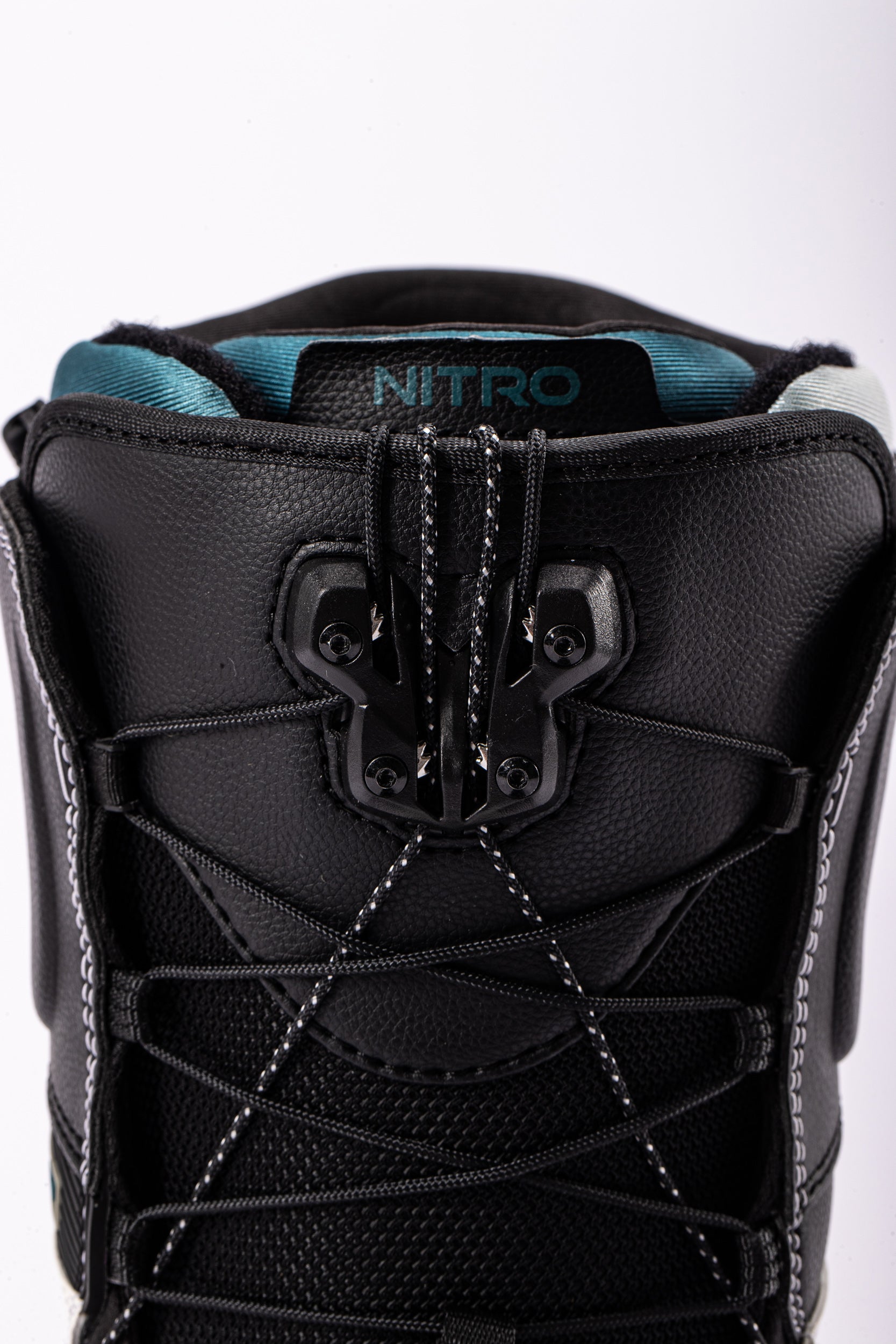 White Nitro Team TLS snowboard boots with front laces, designed for snowboarding in 2027, showcasing a sturdy and comfortable fit.