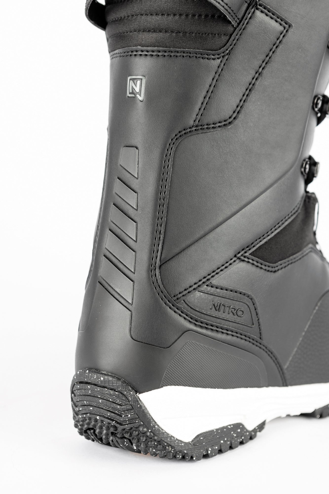 Black Nitro Venture Pro Lace Snowboard Boots from the back, designed for snowboarding in 2027.