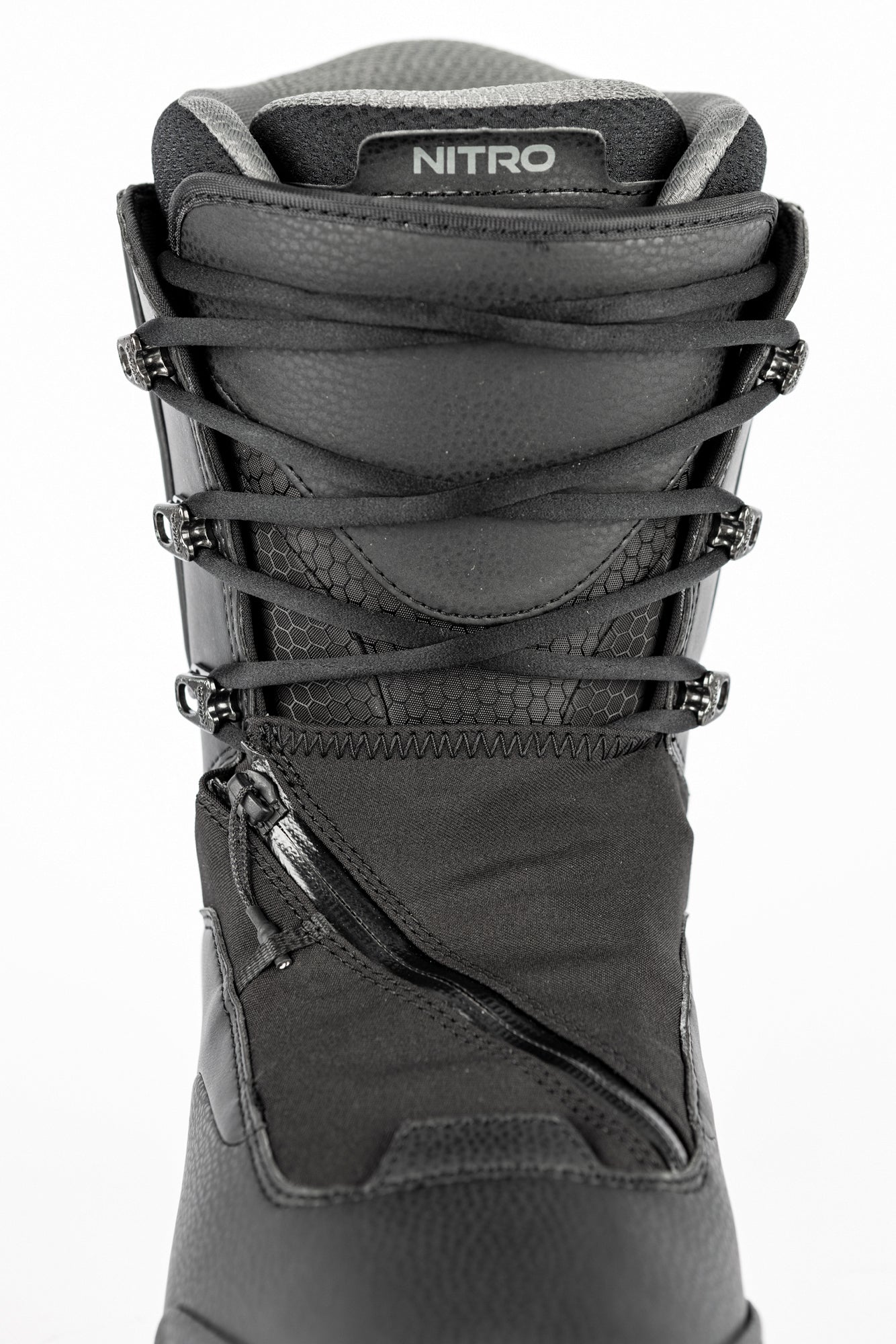 Black Nitro Venture Pro Lace Snowboard Boots with front lacing system, designed for performance and comfort on snow.