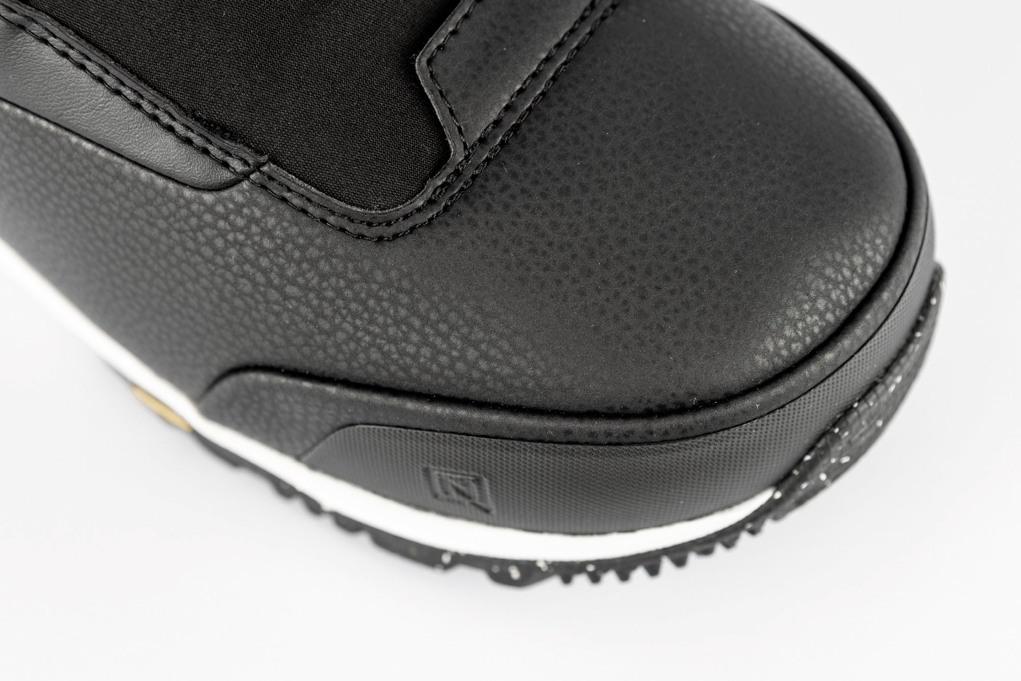 Black Nitro Venture Pro Lace Snowboard Boots with reinforced toe and padded interior for all-mountain snowboarding.