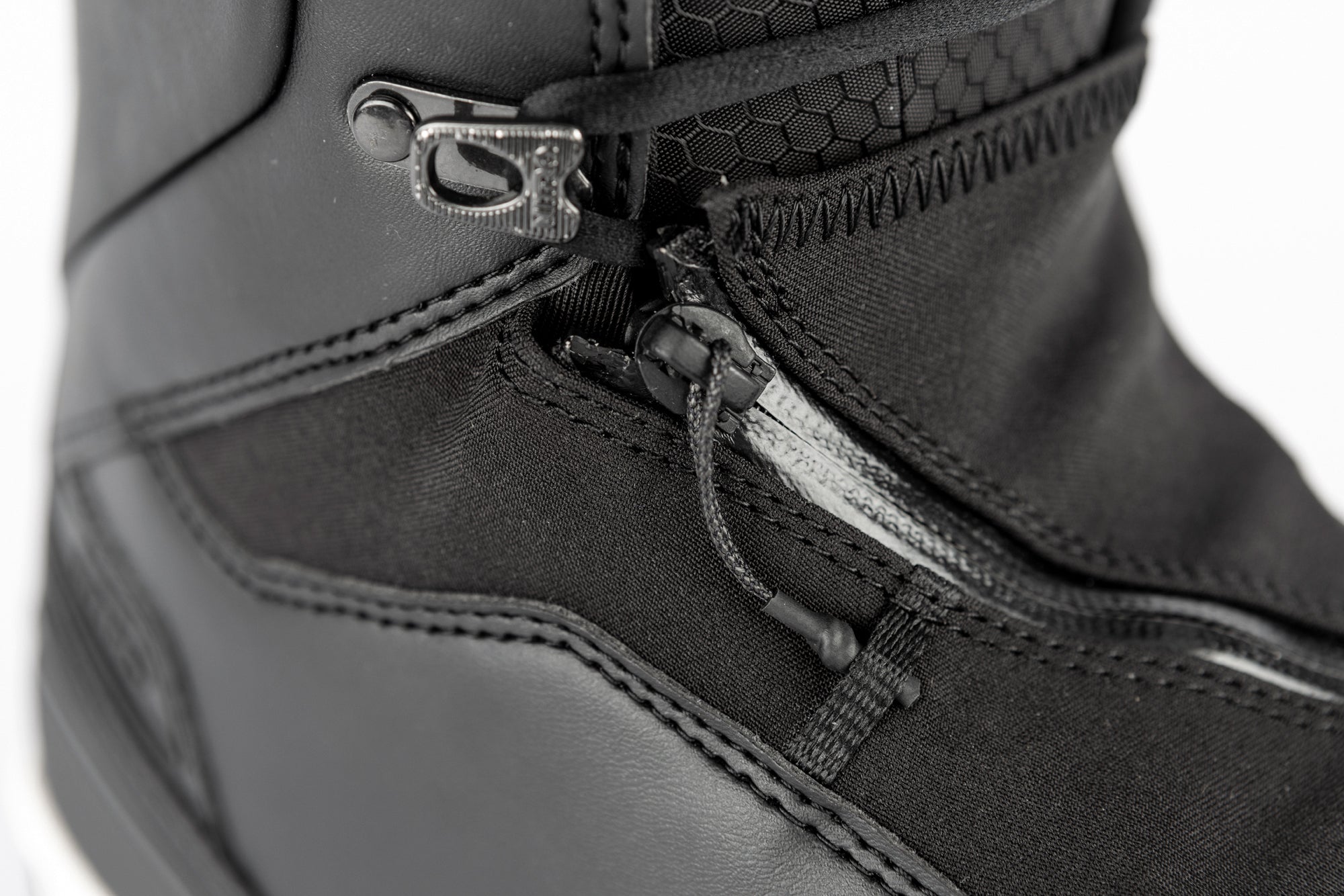 Black Nitro Venture Pro Lace Snowboard Boots with zipper detail, designed for snowboarding performance and comfort.