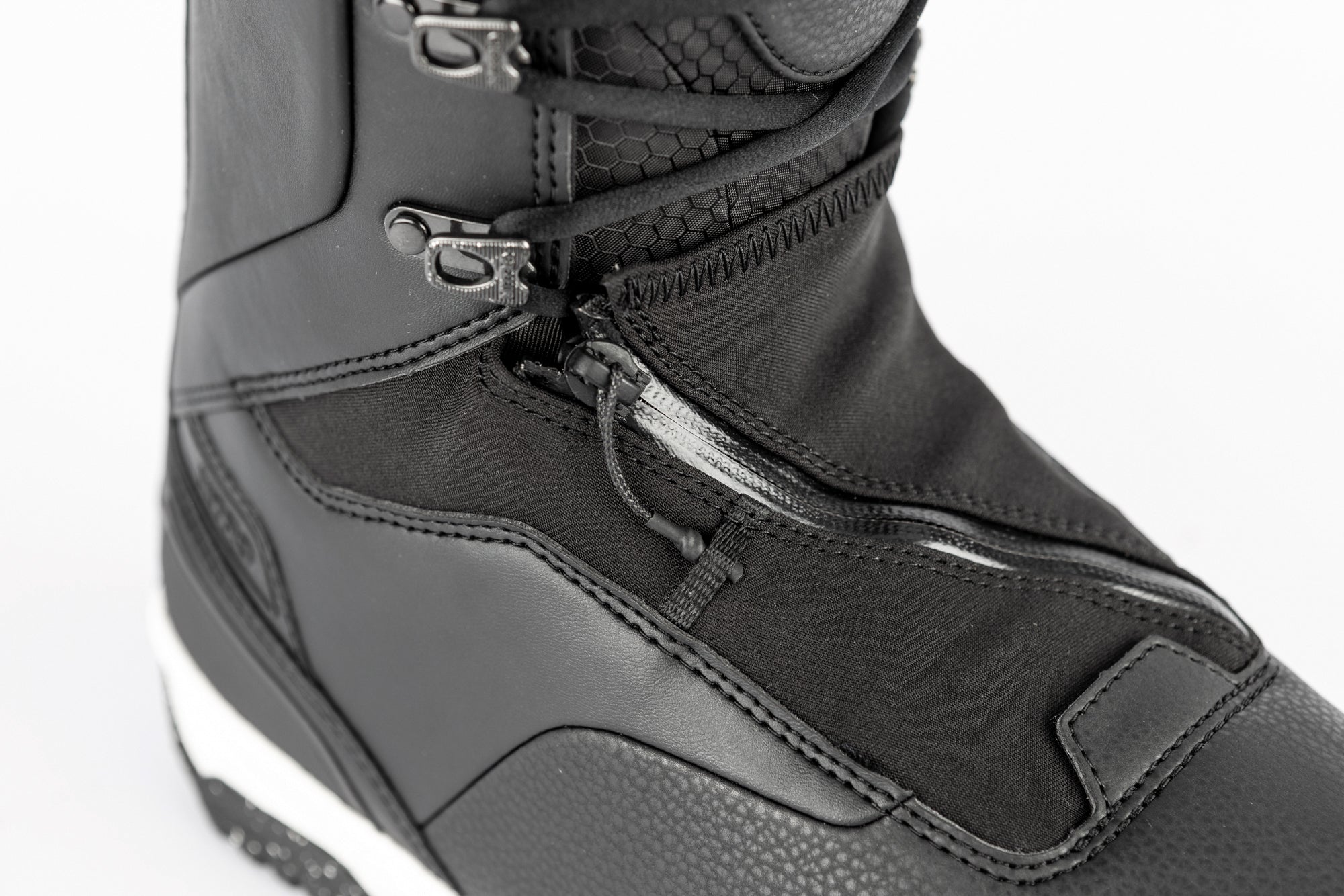 Black Nitro Venture Pro Lace Snowboard Boots with zipper closure and rugged design, ideal for winter snowboarding.