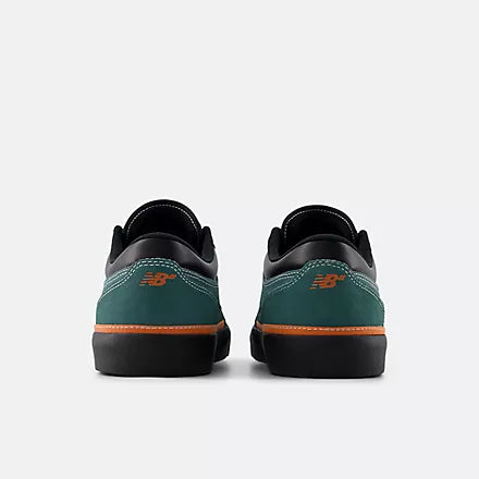 New Balance Numeric Franky Villani 417 low skate shoes in green and black with white accents, featuring a low-profile design and durable sole.