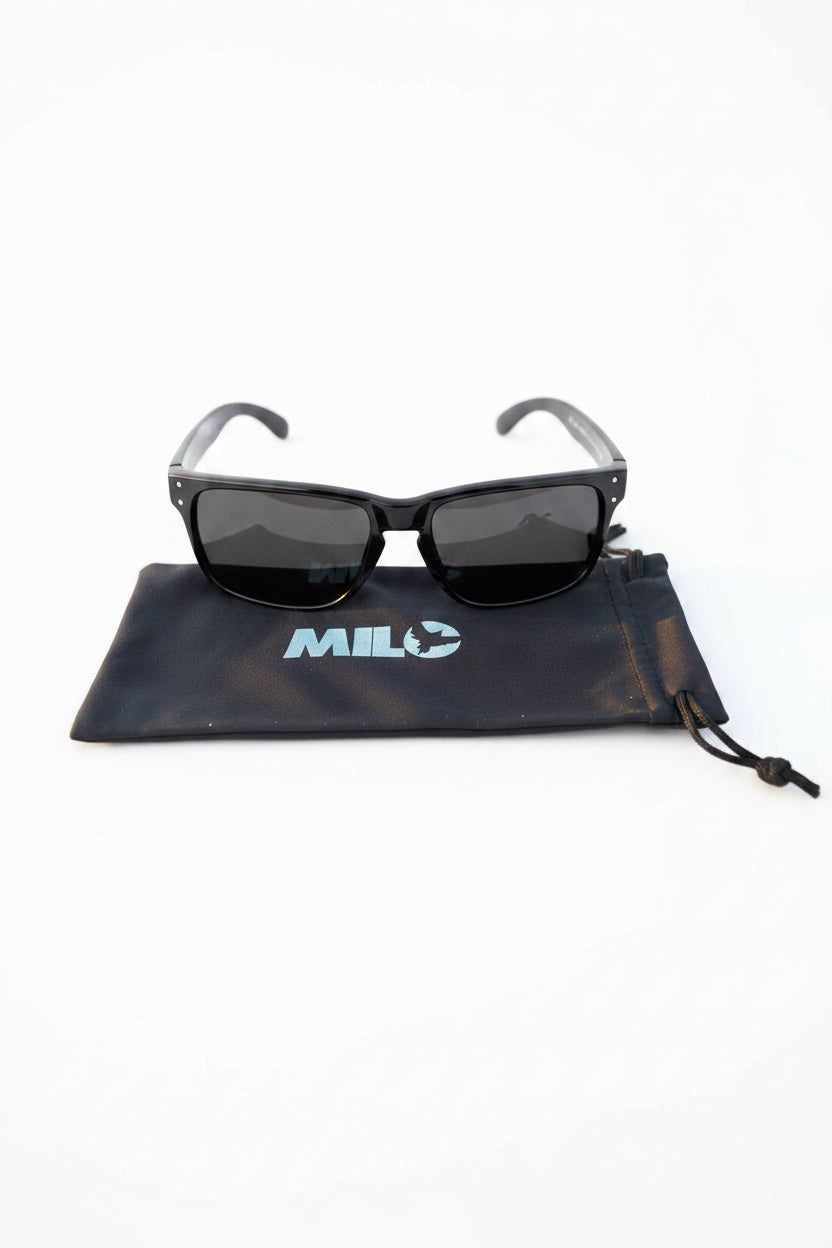 Milosport 3300 polarized sunglasses with black frames and tinted lenses, designed as stylish accessories for outdoor use.