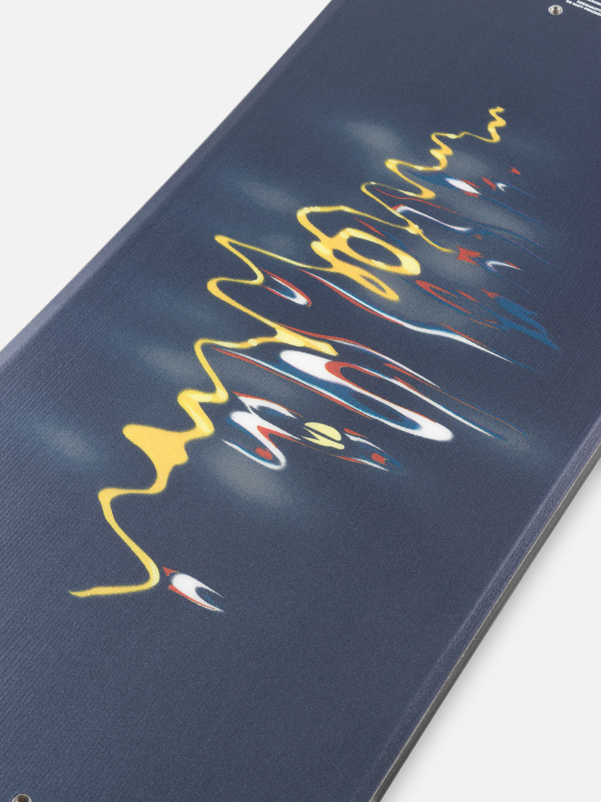 Ride Current Snowboard 2027 with colorful top sheet design, showing the middle section of the snowboard on a white background.