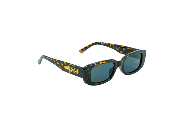 Dang Shades Korvette sunglasses with dark lenses and sleek black frames, stylish accessories for sun protection and fashion.