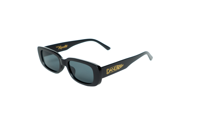 Dang Shades The Korvette sunglasses accessory featuring stylish black frames and tinted lenses for a modern look.