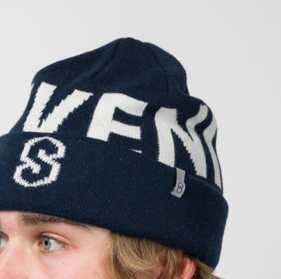 Souvenir Speckled Cuff Beanie for men and women, featuring a cozy knitted design with speckled pattern and folded cuff.