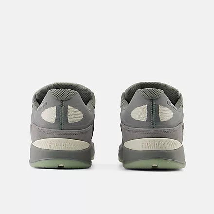 New Balance Numeric Tiago 1010 skate shoes in grey and white with a sleek design and durable construction.