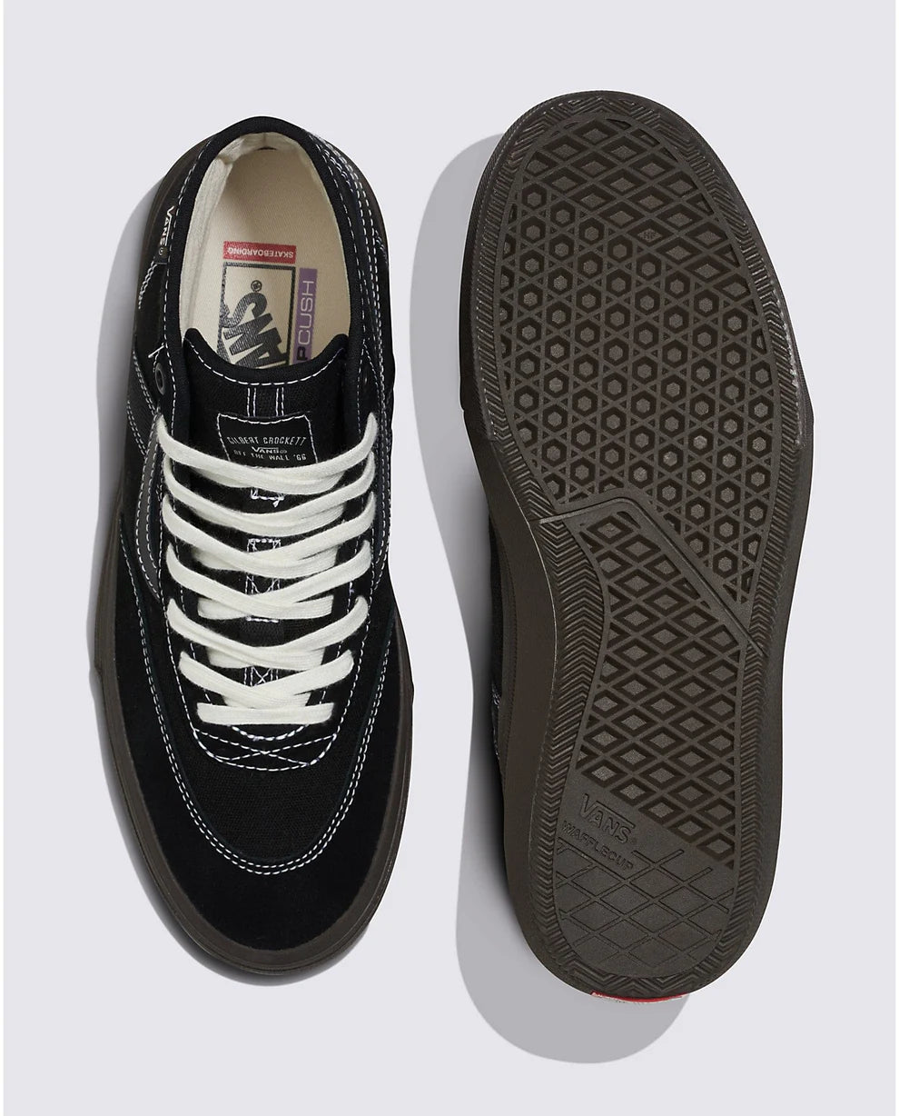 Men's Vans Crockett High sneakers in black and chocolate with a high-top design, showcasing the classic skate shoe style.